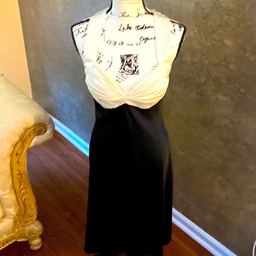 Sophisticated  black and white Calvin Klein dress.  Flattering size ten fit
